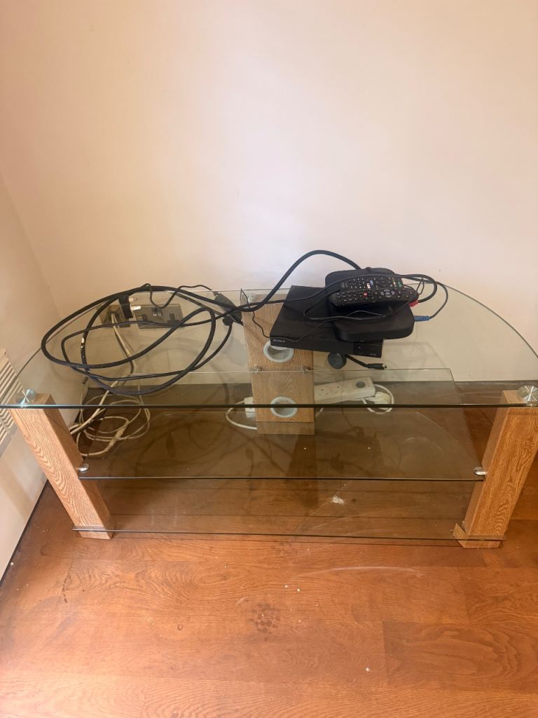 ***Free ***Glass TV Stand with Wooden Supports – Good Condition