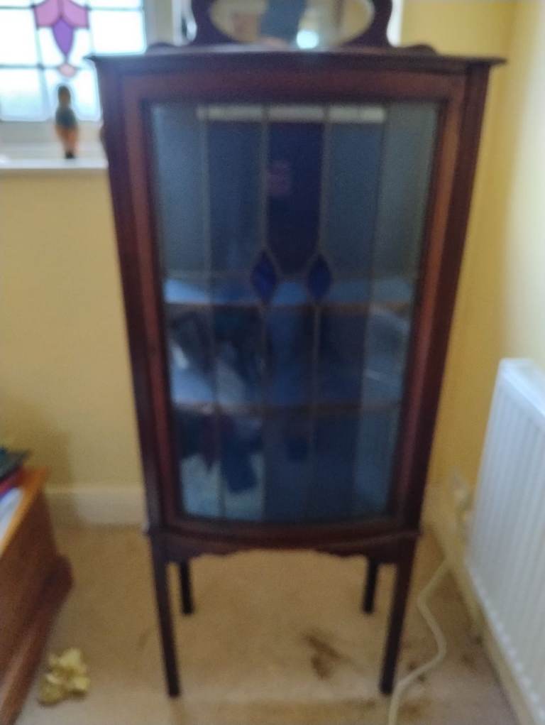 Bow fronted display cabinet