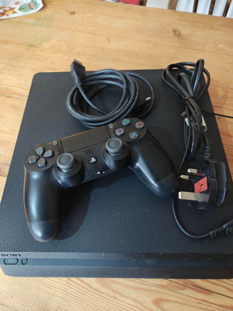Sony PlayStation 4 PS4 with VR Headset, Controllers, and Games