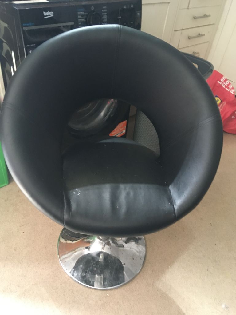 2 second hand faux black dining room/living room swivel chairs 