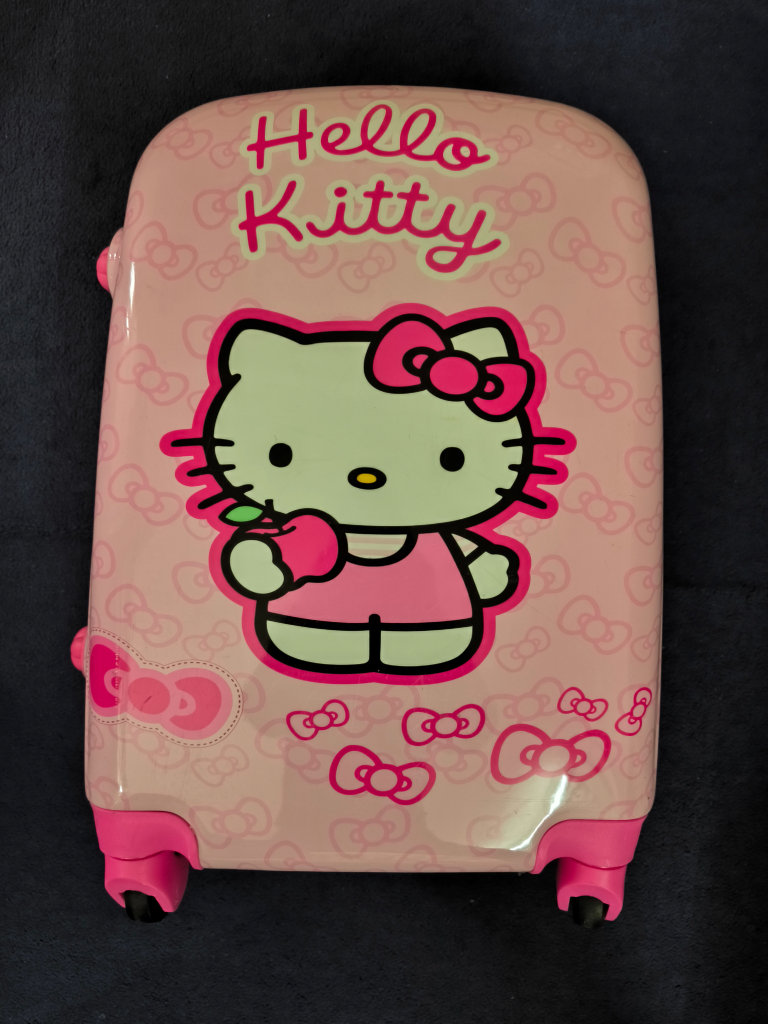 Hello Kitty Suitcase with 4 wheels (like new)