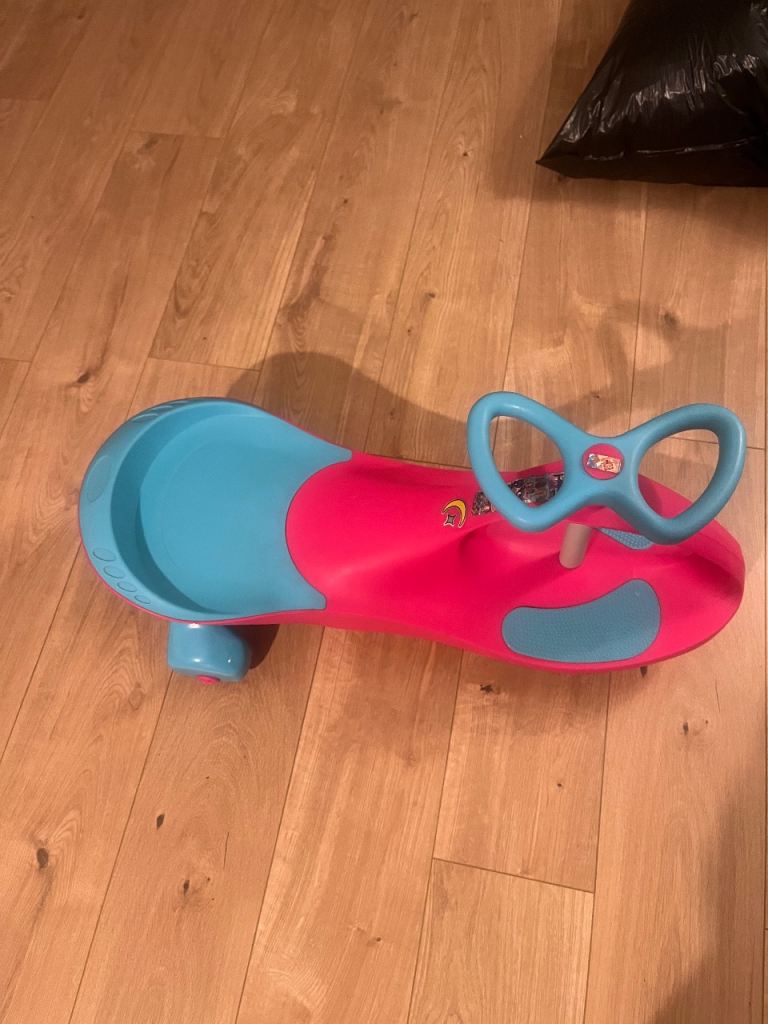 Pink & Blue Kids Ride-On Wiggle Car – Good Condition