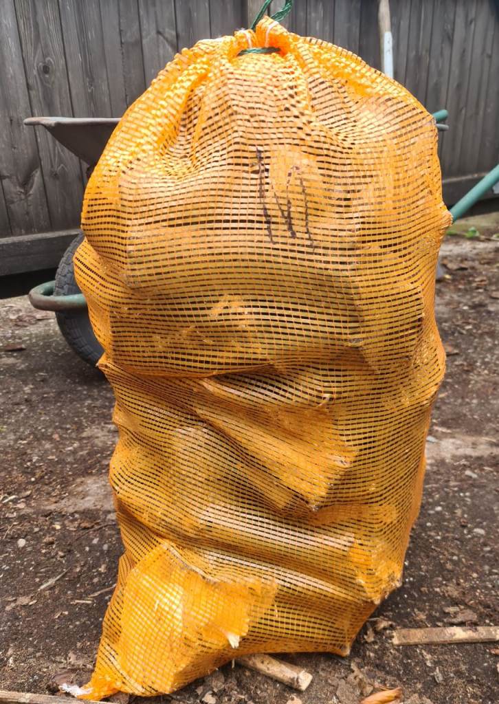 Netted dry seasoned logs