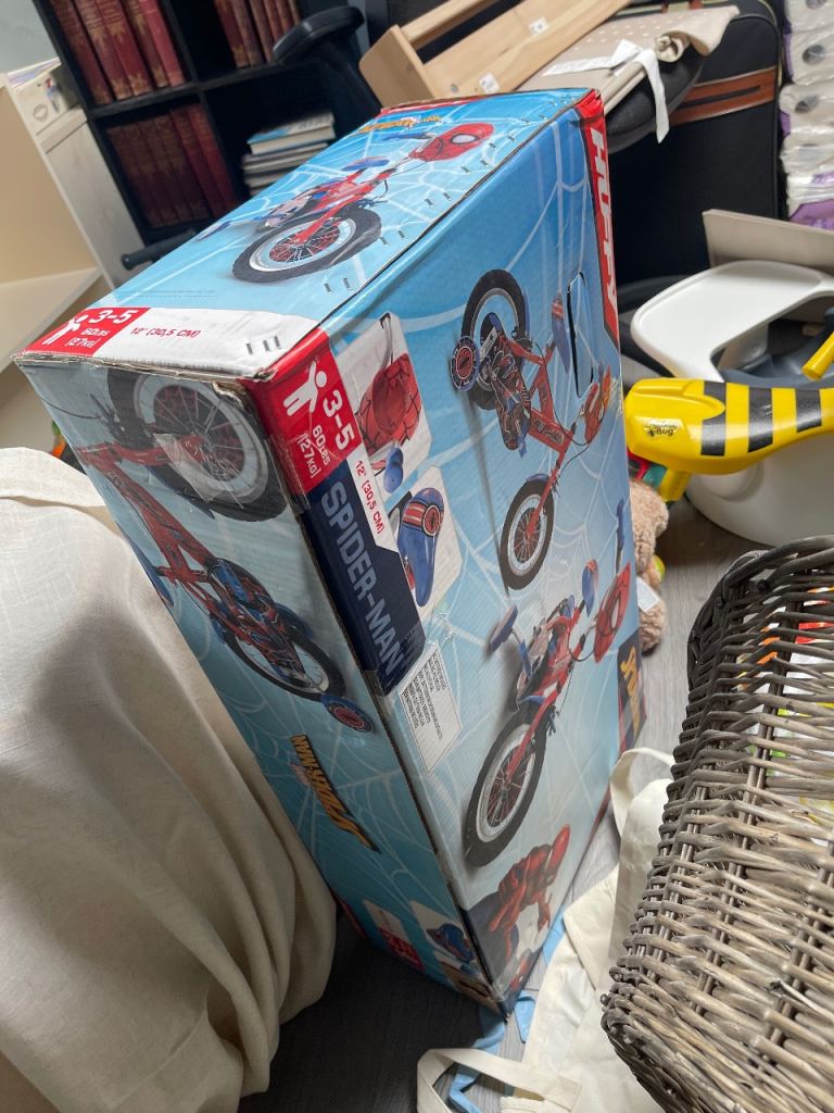 Brand new 12 inch spider man bike