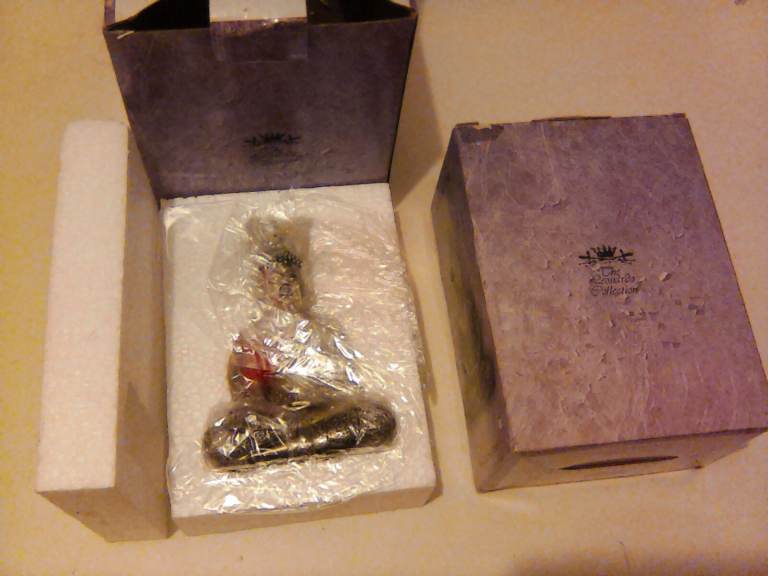 The Leonardo Collection, pair Silver Thai Amulet Figurines,