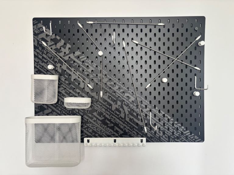 Black Pegboard with Accessories – Good Condition