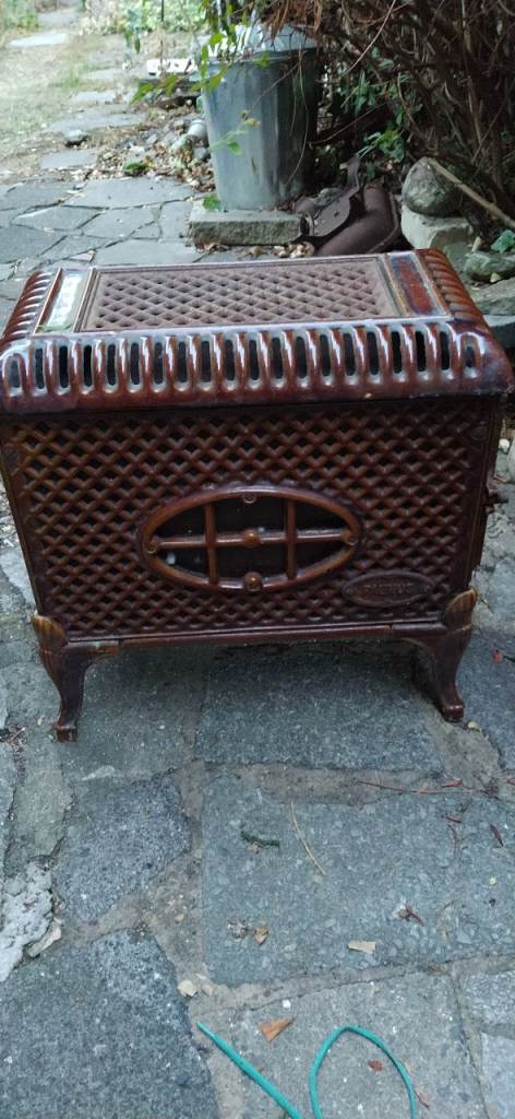 Vintage Cast Iron Wood Burner with Ornate Design