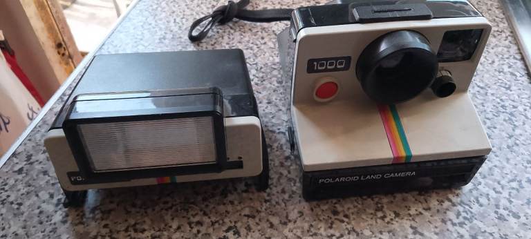 Vintage Polaroid Land Camera 1000 with Flash – Good Condition