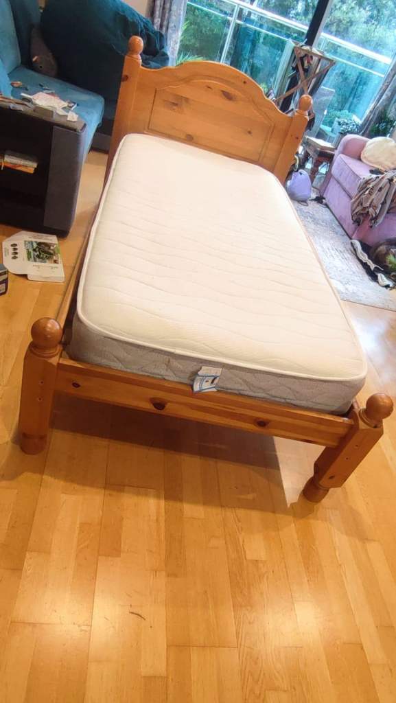 Pine single bed with 6 month old mattress.