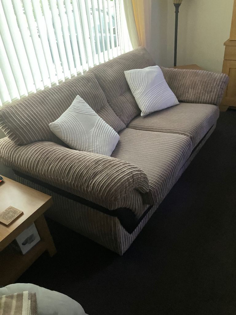 Large 2seat Sofa bed seats 3   Bed never used corduroy beige excellent condition 