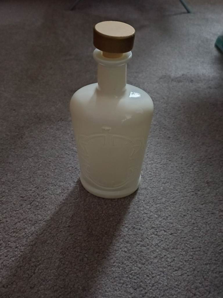 **FREE** Creamy Coloured Glass Bottle 