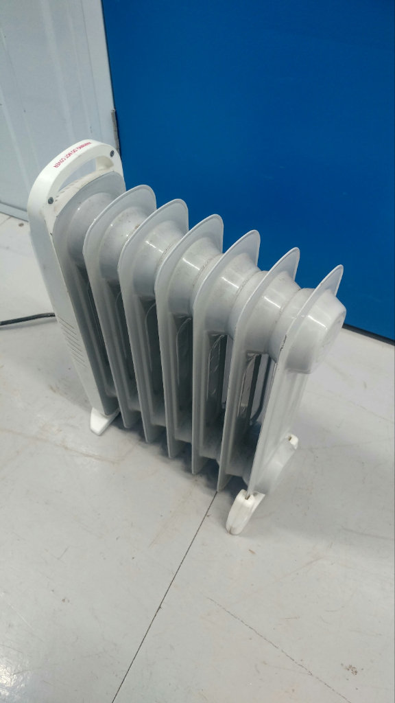 Mini oil radiator. Winter. Autumn. Bedroom. Living room. Conservatory. Hallway. Landing. House Home.