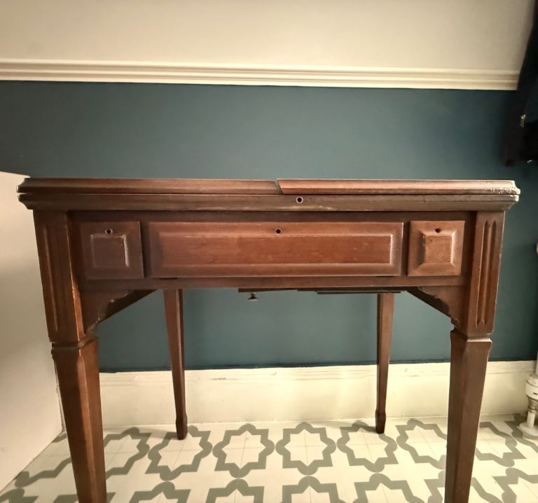 Table with hidden vintage Jones sewing machine inside 