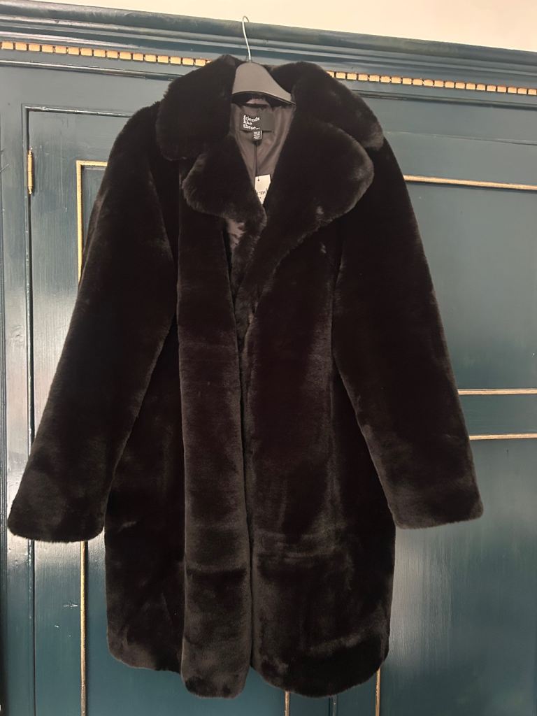 image for New with tags faux fur coat