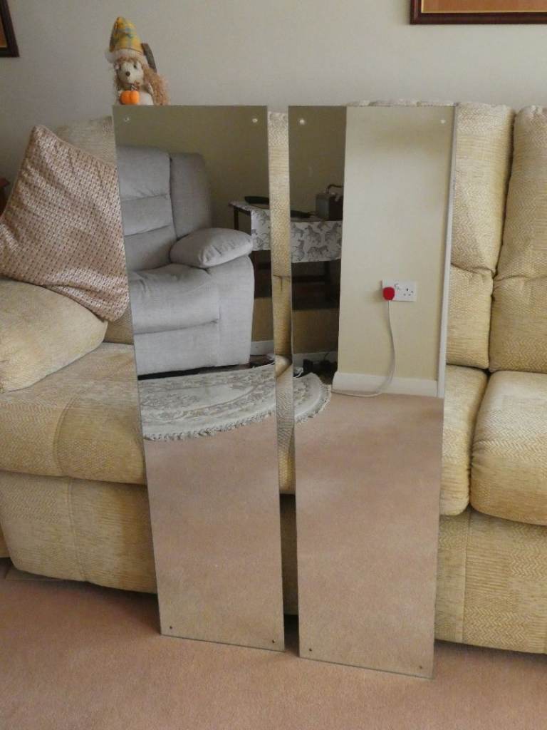 matching pair of drilled long mirrors