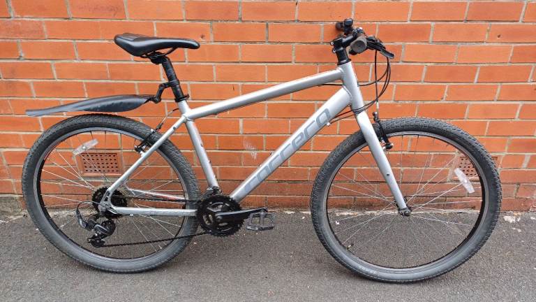 Carrera Parva Hybrid , City Bike - lightweight aluminium frame , platfor pedals , good Tektro brakes