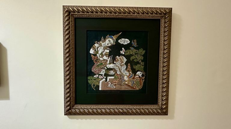 Pair of framed Thai painted pictures 