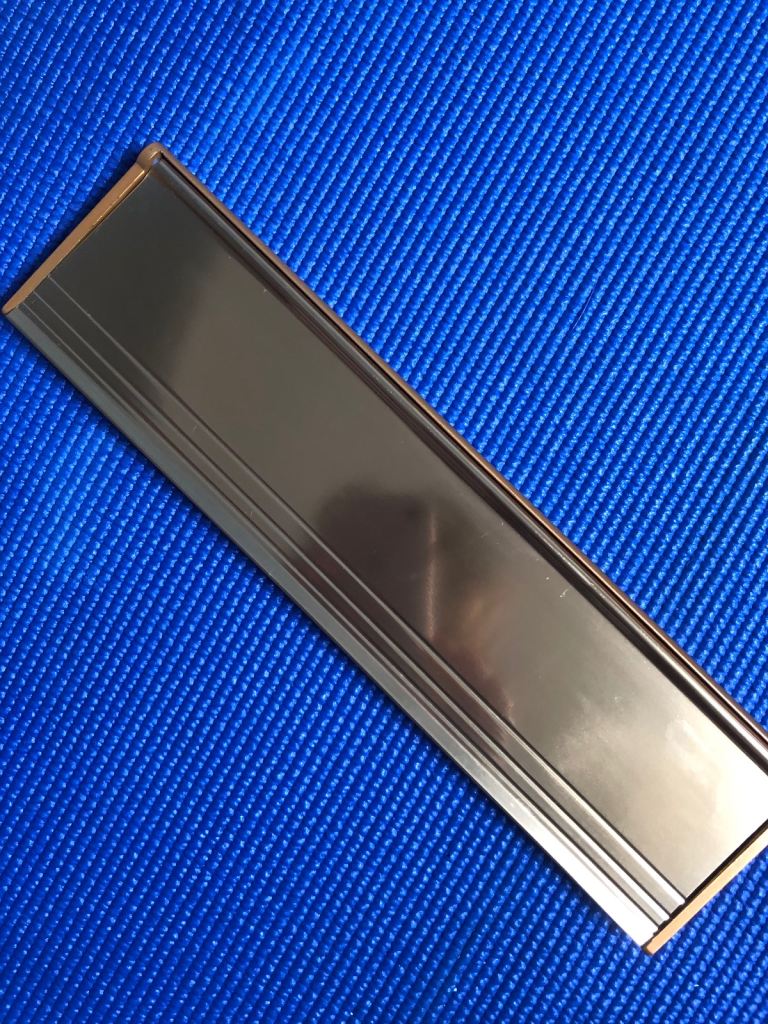 Gold letterbox cover