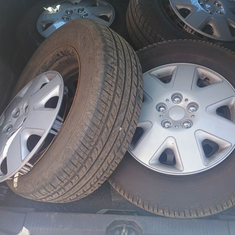 4 stud Corsa wheels and tyres 