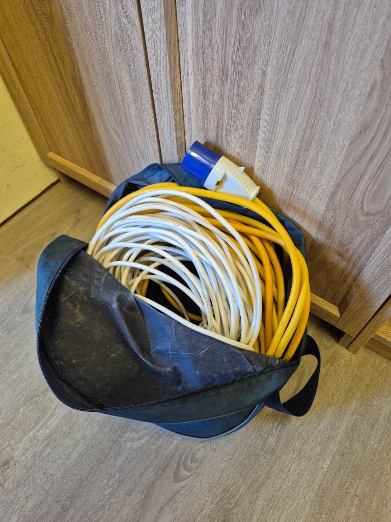 Caravan hook up electric cable and ariel lead