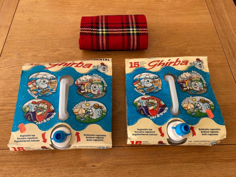 Two Camping Collapsing Water Tanks and Picnic Rug