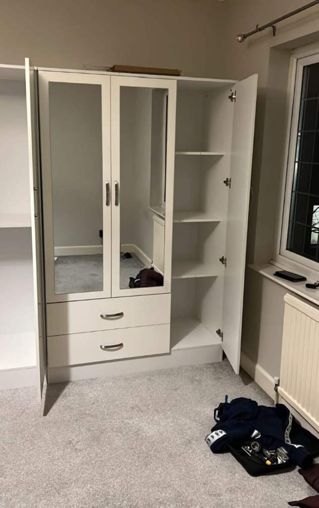Grey Triple Wardrobe with Shelves and Drawers – Good Condition