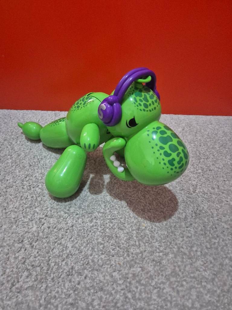 Balloon Dog Dinosaur Toy with Headphones - Green