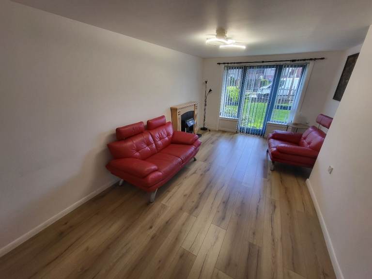 Main door two-bedroom flat with garden on Easthall G33