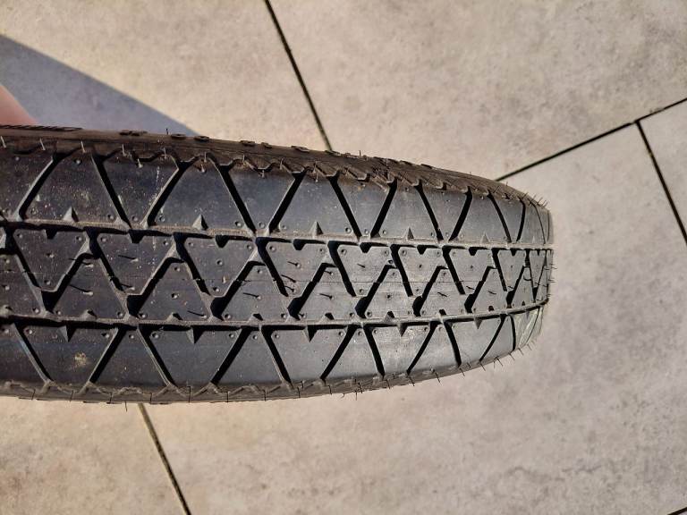 Unused spare, temporary use wheel