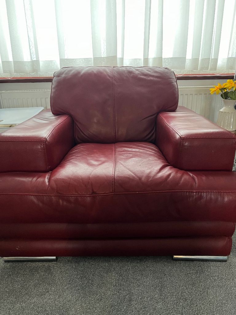 DFS burgundy leather armchair