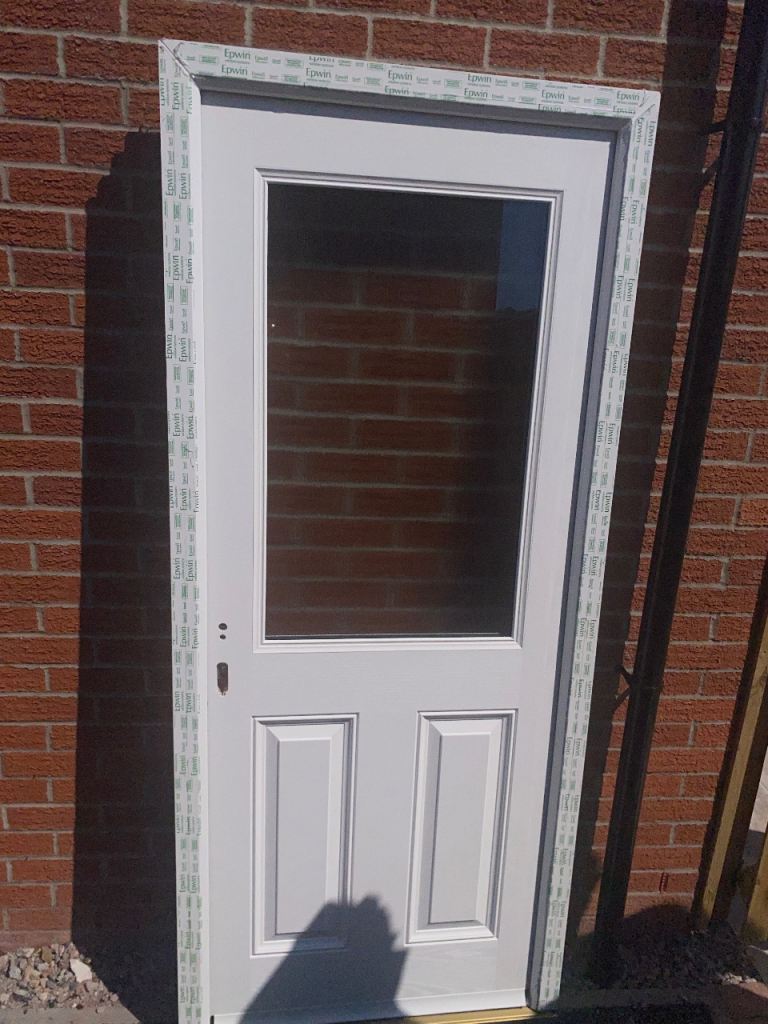 Brand new white composite back door  with frosted glass 