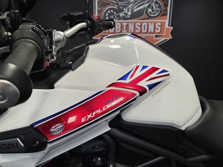 2013 Triumph Tiger Explorer 1215 in white with luggage.