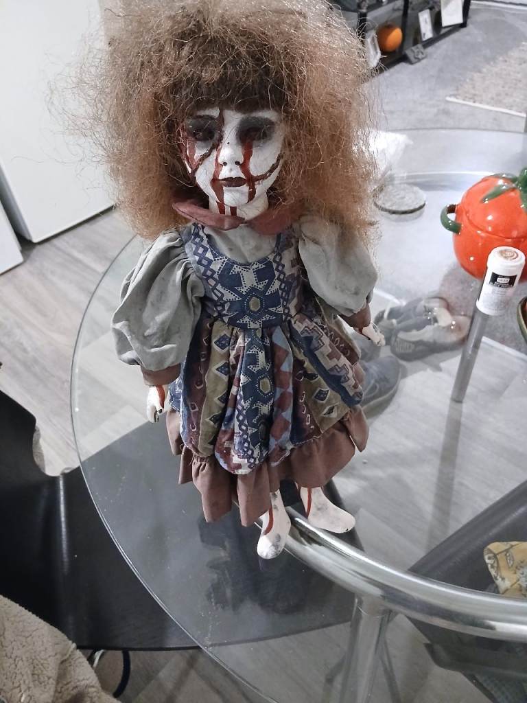 Creepy Doll with Blood-like Stains - Good Condition