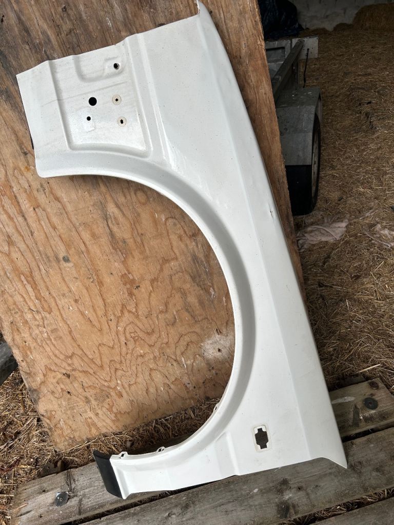 Nissan Bluebird front left hand guard/wing