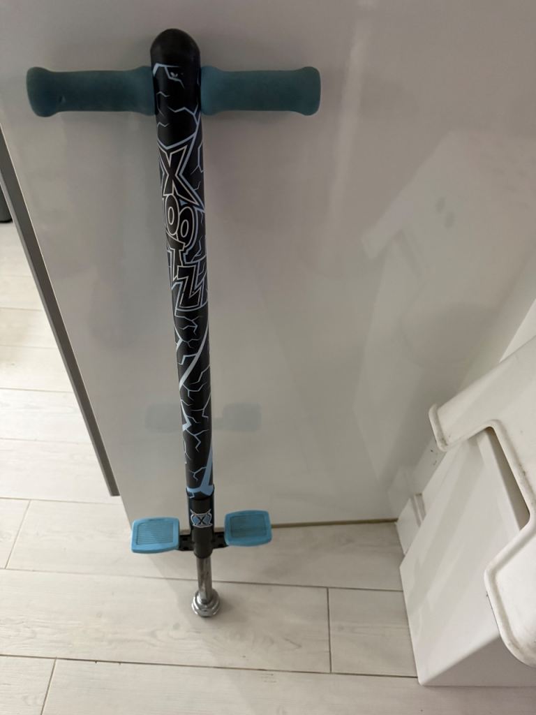 Ozbozz Lightning Pogo Stick – Black and Blue, Good Condition