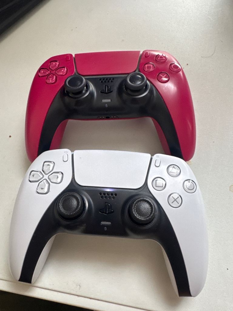 Two PS5 DualSense Controllers – Red and White, Good Condition