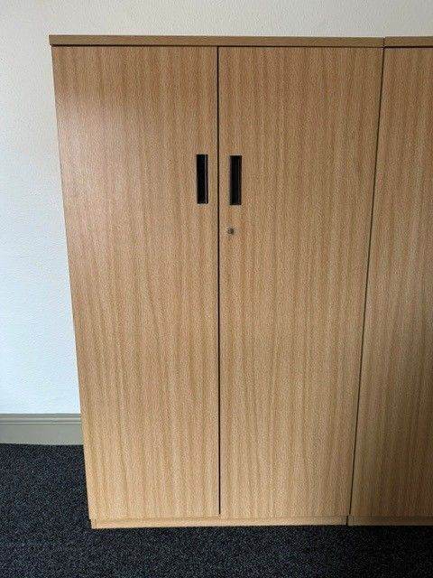 Two wooden filing cabinets