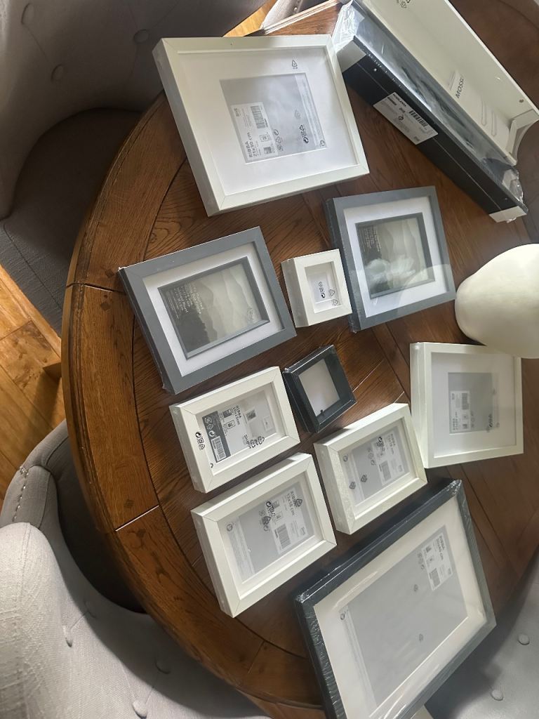 Various size photo frames and 2 shelves 