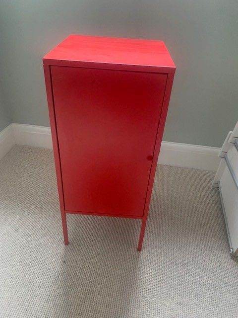 Red metal storage locker