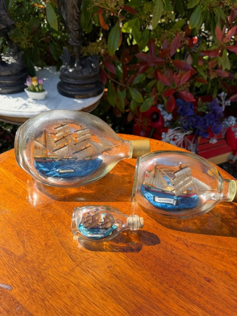 Vintage Set of 3 ships In bottles housed in Haig & Haig dimple whiskey bottles.