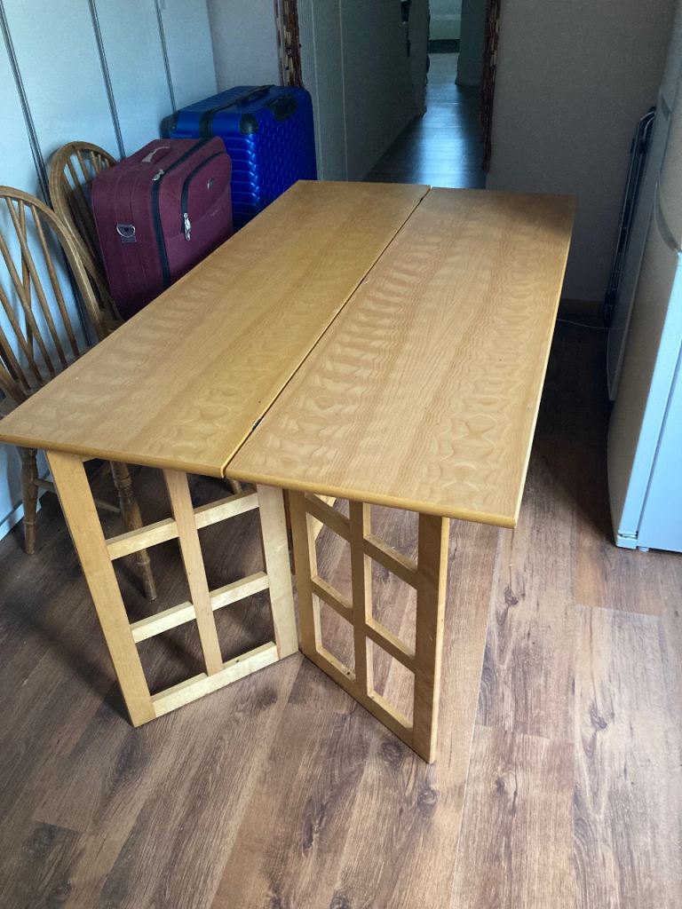 A “book” dining table