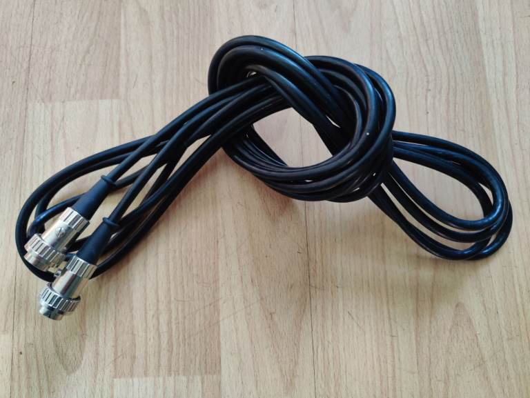 16m cable with metal 8-pin male DIN plugs on each end. Used.