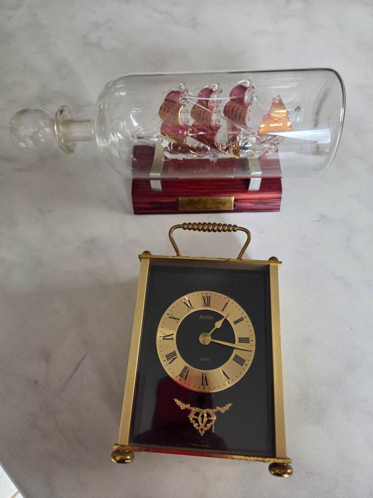 Clock and glass ship 