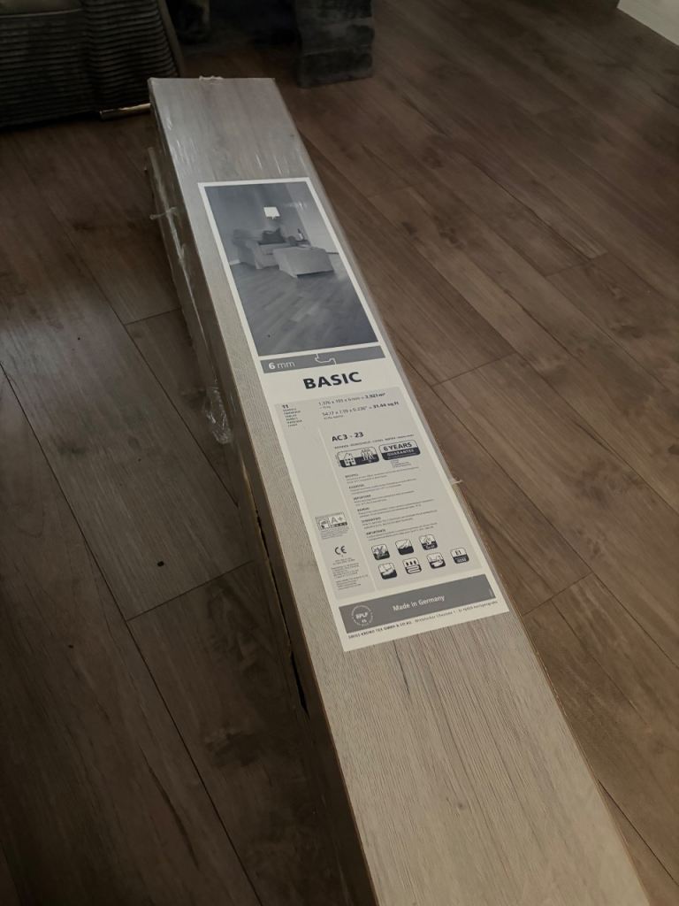 Oak grey laminate flooring and edging 