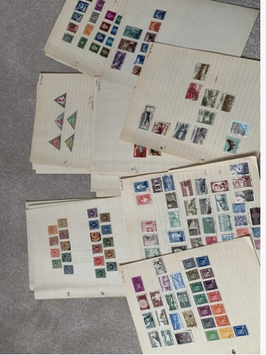 Box with thousands of stamps from all over the world.