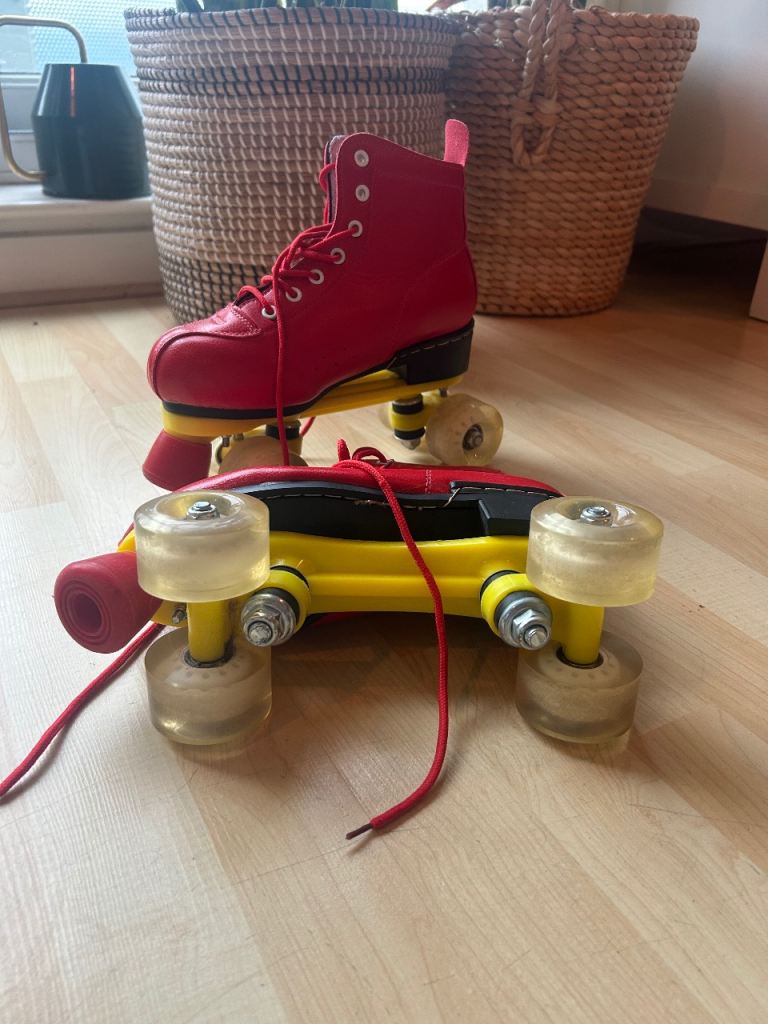 Vintage leather red roller skates 