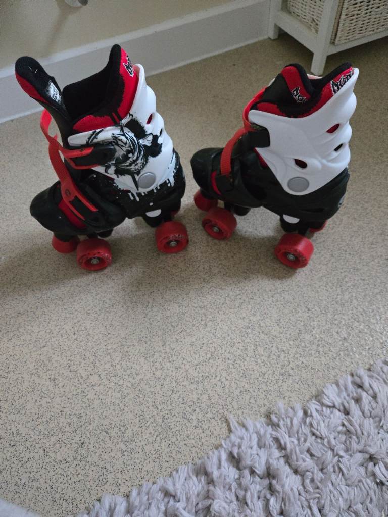 Osprey size adjustable quad skates roller boots size 13 to 3