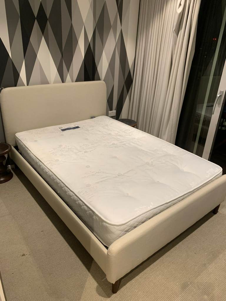 Double bed with mattress in good condition 