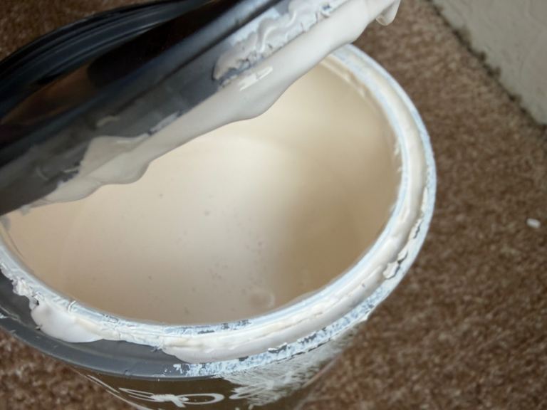 Two tins with a bit more then 2L of Valspar Almond Milk Matt Paint