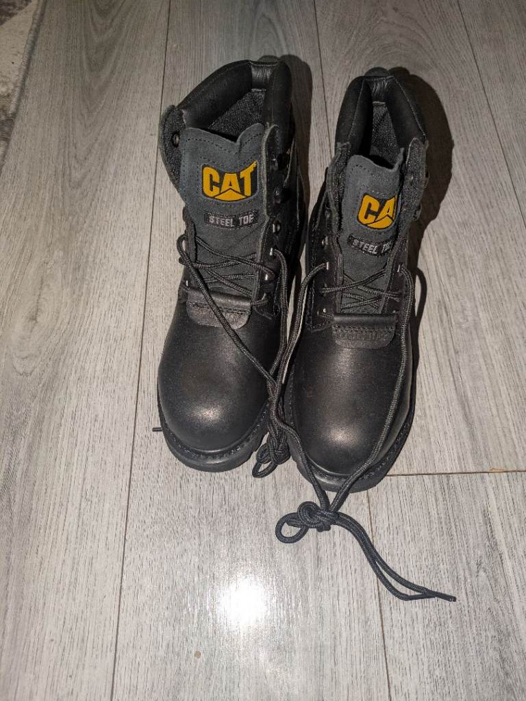 Brand new CAT boots black size 7